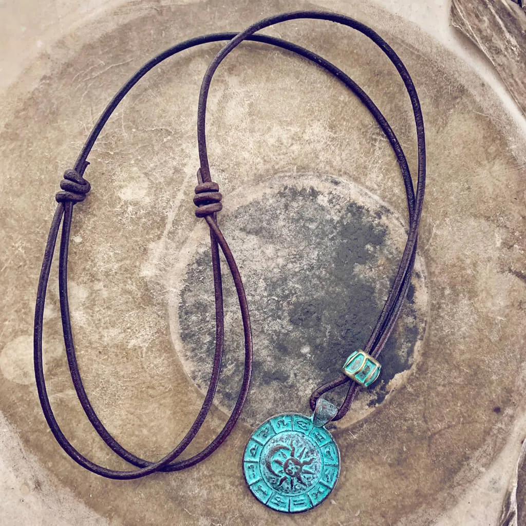 zodiac // men's sun & moon medallion leather necklace